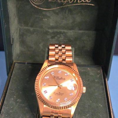  A Vintage Dufonte by Lucien Piccard gold-tone Quartz Wristwatch With A Genuine Diamond dial. 