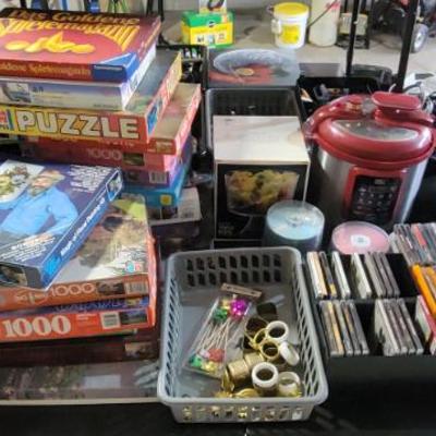 Sale Photo Thumbnail #237: Puzzles and Pressure Cooker