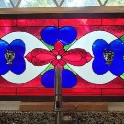 Handcrafted Stained Glass Window with Red and Blue Floral Design