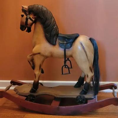 Antique Wooden Rocking Horse with Iron Wheels and Leather Saddle