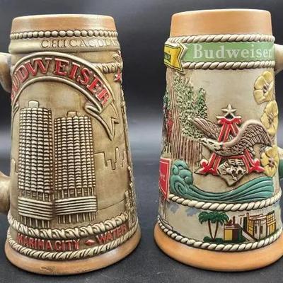 Budweiser beer steins, Chicago-themed stein/California-themed stein. 