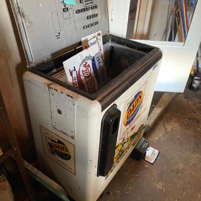 Super cool soda pop cooler. Doesn't run right but we've got the parts to fix it. For a handy person like yourself this would be...