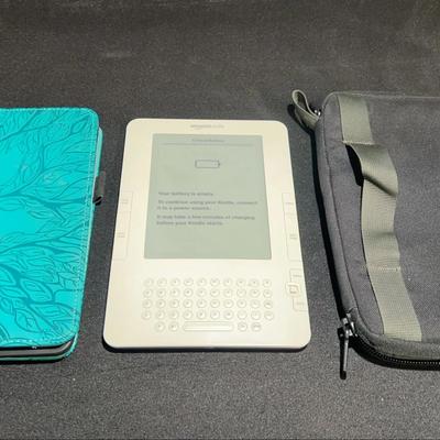 2nd Generation Amazon Kindle e-reader with case and zippered bag