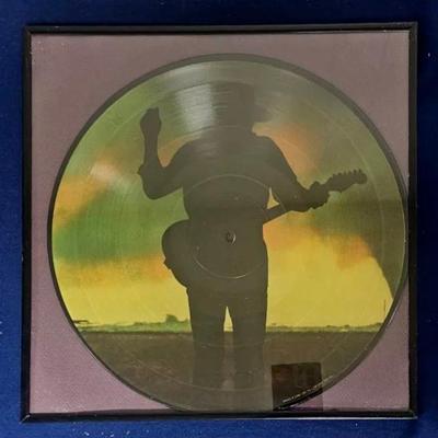 Framed Vinyl Album "Couldn't Stand the Weather" by Stevie Ray Vaughan and Double Trouble. 