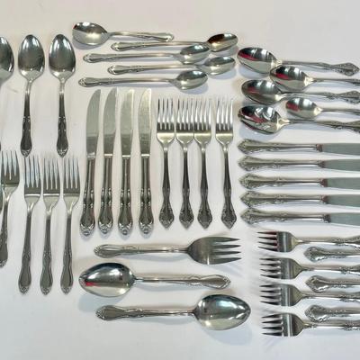 Two Sets of Stainless Steel Flatware By Oneida And Estia 