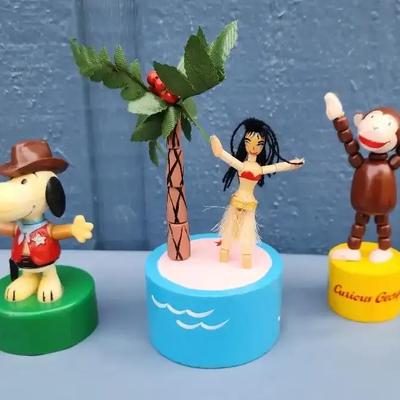 Set of 3 Vintage Push Puppets – Snoopy, Hula Girl, and Curious George
