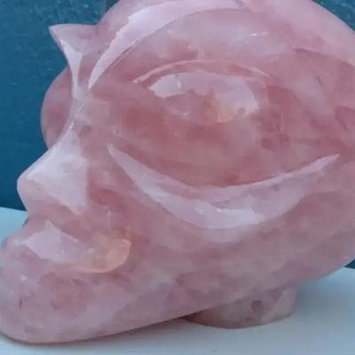 Carved Rose Quartz Crystal Skull – Polished Pink Stone Sculpture
