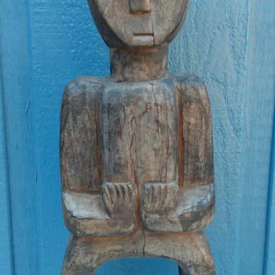 Primitive Hand-Carved Wooden Figure – Tribal or Folk Art Style

