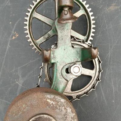 Antique Hand-Crank Grinder with Gear Mechanism
