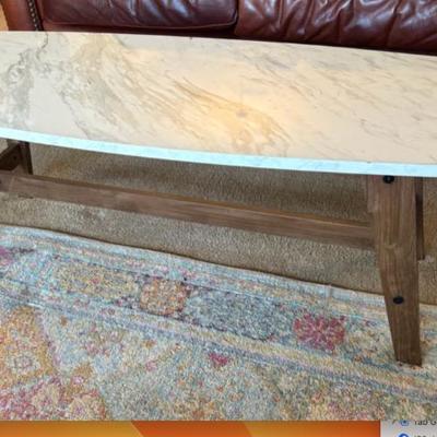 Sale Photo Thumbnail #57: faux marble coffee table $75
50 X 18 X 17"