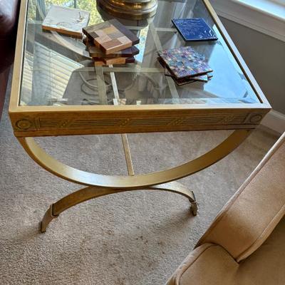 Sale Photo Thumbnail #56: glass and metal table $125
24 X 22 X 23"