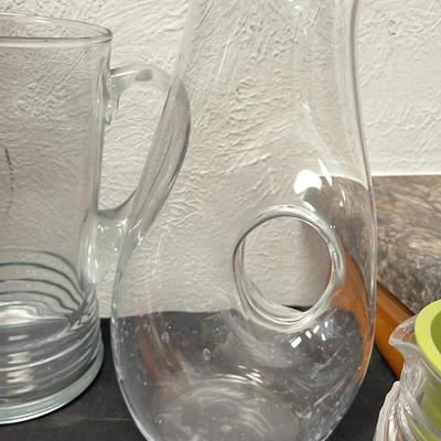 Lot of Kitchen Goods and Glassware Pampered Chef Loaf Pan Glass Pitchers 