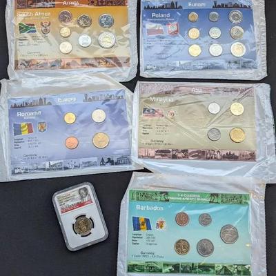 5 Uncirculated Sets of Foreign Coins & NGC Graded African Coin