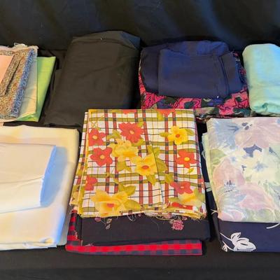 Lot 421: Lot of Assorted Fabric – Floral, Solid, and Patterned Cotton & Blend Material
