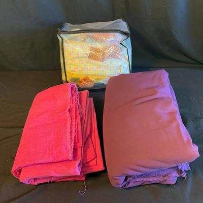 Lot 417: Lot of Solid and Patterned Fabric – Red, Purple, and Multi-Color Quilting & Sewing Material