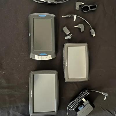 Lot 329: Lot of GPS Navigation Devices – TomTom & Others with Accessories