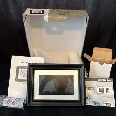 Lot 313: Pandigital 7” LCD Digital Photo Frame – Model PAN7001W01 (Boxed with Accessories)