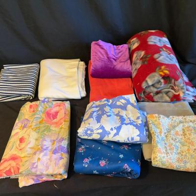 Lot 419: Large Lot of Assorted Fabric – Floral, Fleece, Stripes, and Solid Colors