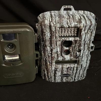 Lot 346: Two Trail Cameras – Tasco and Moultrie Models