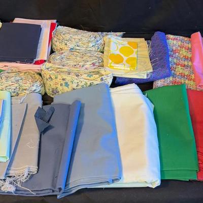 Lot 441: Large Lot of Fabric Remnants – Solids, Prints, and Quilting Cotton Rolls