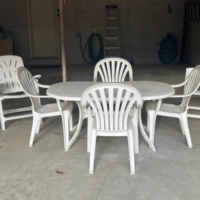 Outdoor Plastic Patio Table with 4 Stackable Chairs and 4 Folding Chairs