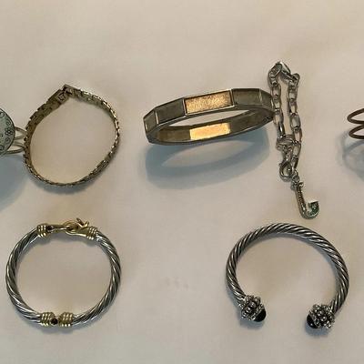 Seven Silver Tone Bracelets 