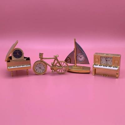 Four Miniature Timex Brass Clocks