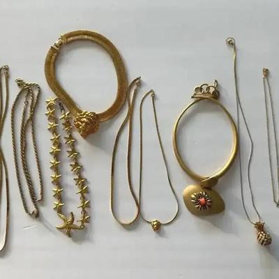 11 Gold Tone Necklaces