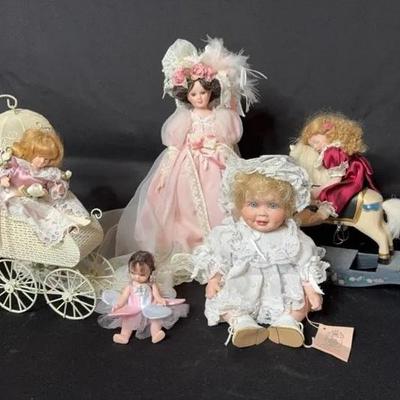 Vintage Porcelain Dolls and Carriage