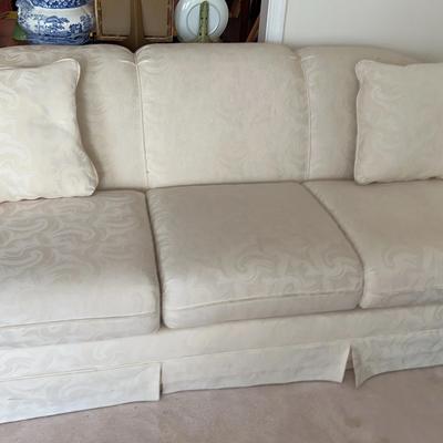 Cream Colored Upholstered Sofa