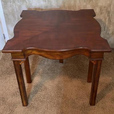 Chippendale-style mahogany serpentine console or card table.