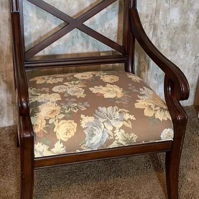 Drexel Heritage dining armchair with a floral upholstered seat.