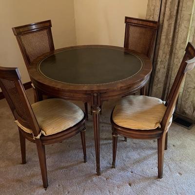 Wooden Game Table (3’ Diameter x 29”H) with Woven Chairs (3’H x 18”W x 17”D)