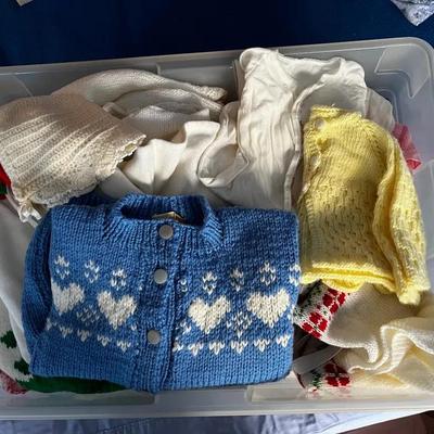 Bin Of Handmade Knit Children’s Clothes