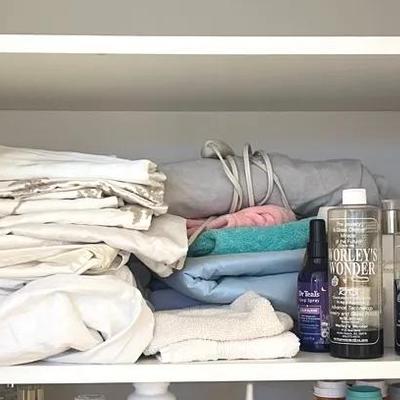 Linen Closet Cleanout Shelf with Sports Wraps, Luxe Linens, Perfumes, Heating Pad