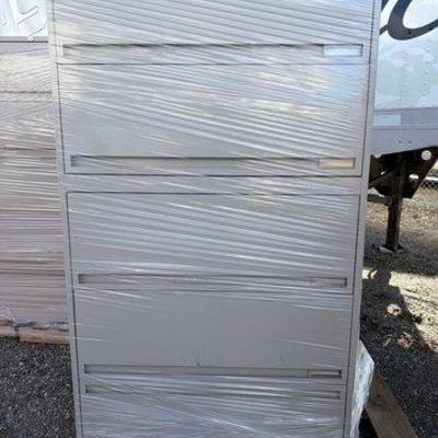 91010 • 2 metal filing cabinets with 1 key