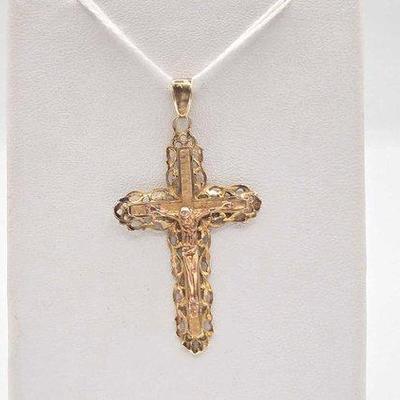 718 • 14k gold cross, 2.9g