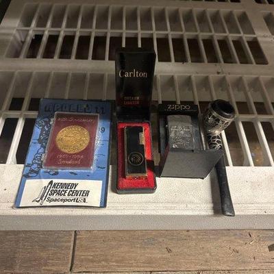 4518 • kennedy space center coin, 2 lighters, tabbaco pipe