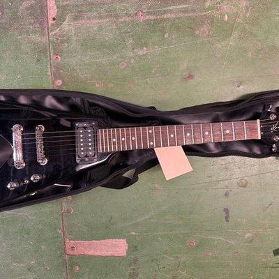 6100 • kona electric guitar with carrying case