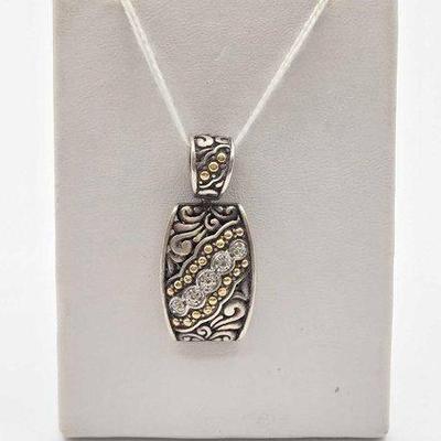 602 • 18k gold, sterling silver and diamond pendant, 7.5g