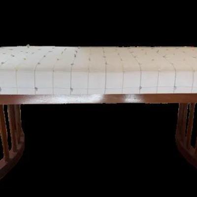 Wooden bench with cushioned/fabric top