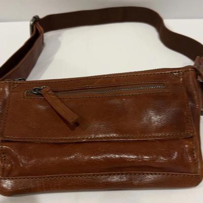 Spikes & Sparrow leather crossbody bag in a brandy color