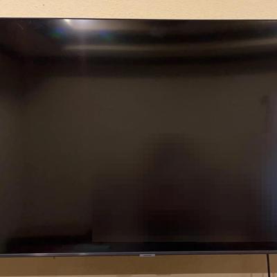 Samsung 56” TV with Remote  (Wall Mount Not Included)
