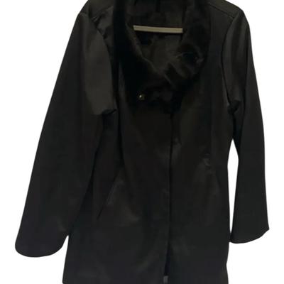 Ellen Fisher, black fur line jacket
