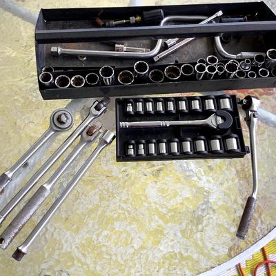 set Of Socket Wrenches And Sockets