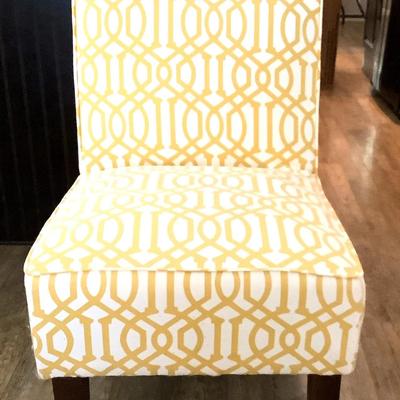 Armless Casual Chair With Geometric Pattern Upholstery