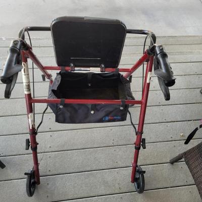 Sale Photo Thumbnail #39: Adjustable height walker with seat/storage.
2 available 