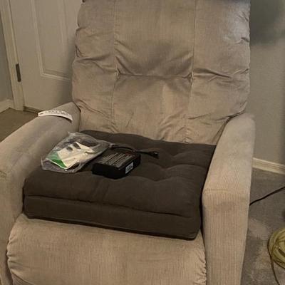 Sale Photo Thumbnail #12: LaZBoy power recliner. 
Also shown: extra cushion