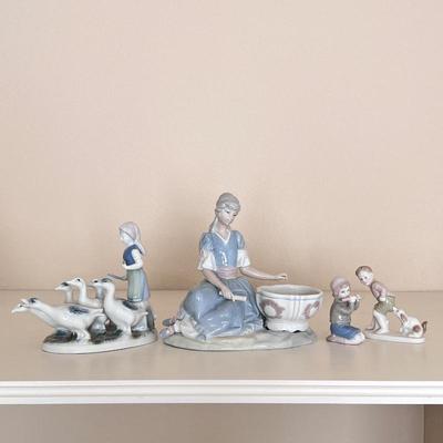Vintage Porcelain Ladro Figurine Kneeling Woman in Blue Dress, plus other similar Figurine