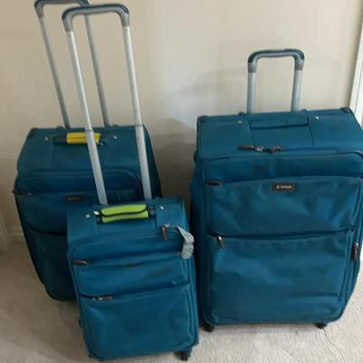 Turquoise Luggage (upstairs)